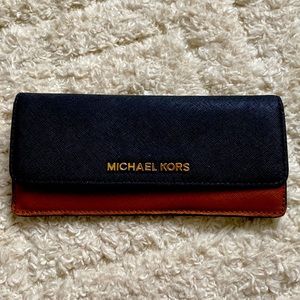 Brand new Michael Kors wallet in black and brown